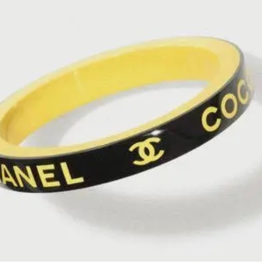 Yellow and black Chanel resin bangle bracelet